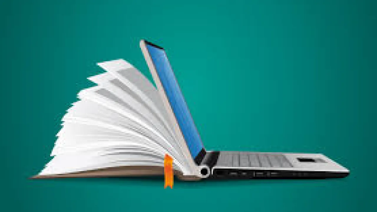 open book with laptop